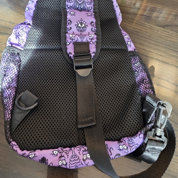 Haunted Mansion-themed sling backpack is a purple crossbody bag - Picture 8 of 8